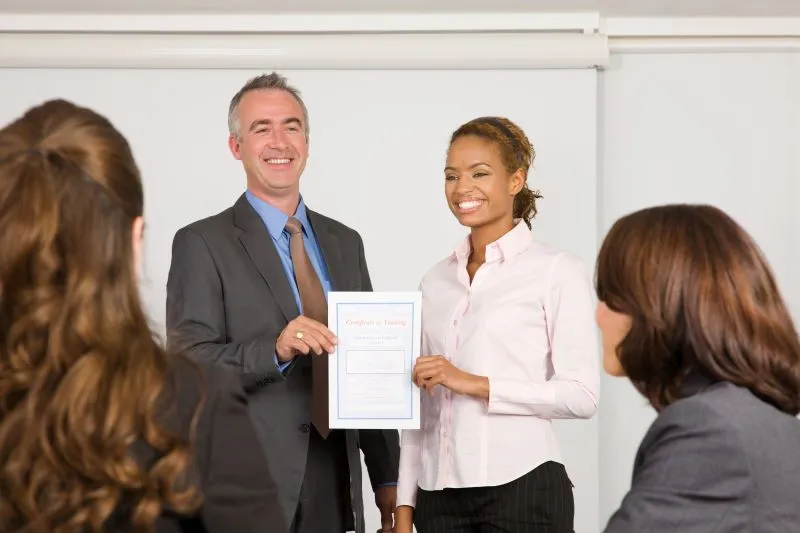 Interpreter receiving certification for completion of training program