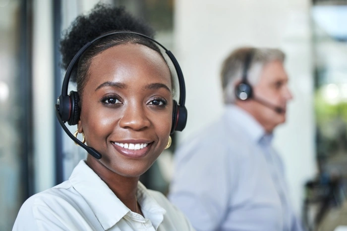 Professional interpreter with headset exemplifying high standards in Interpreter and Translator Credentials, providing reliable language services.